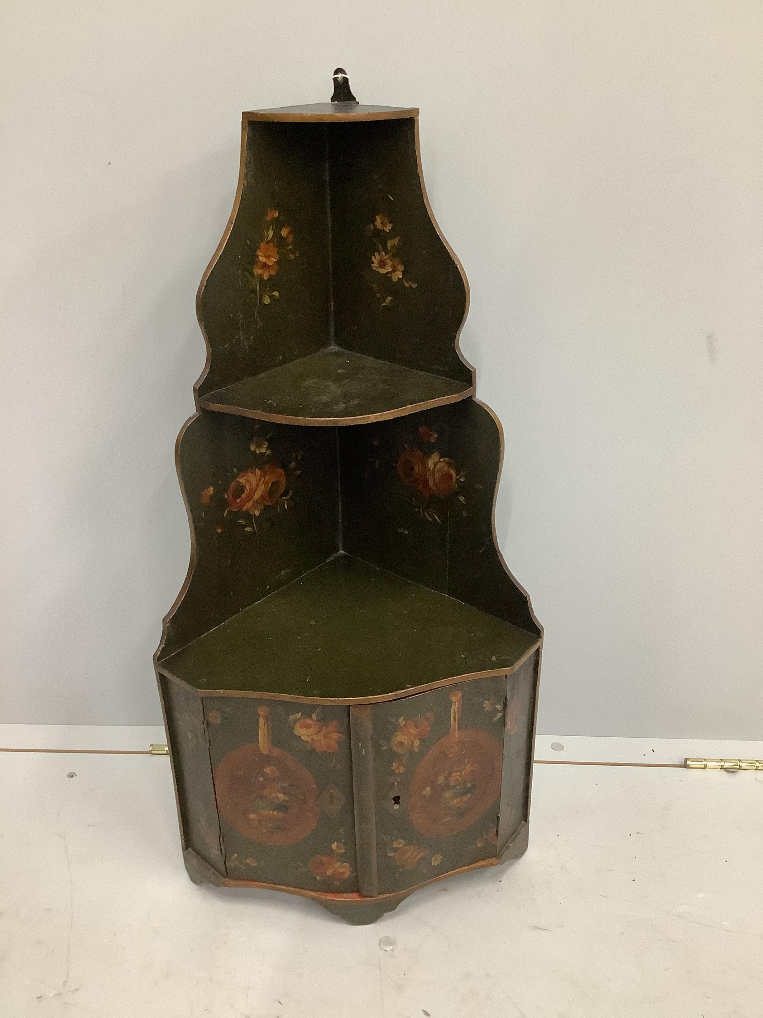 A 19th century Continental painted hanging corner cabinet, width 37cm, depth 25cm, height 75cm